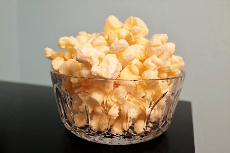 One of the easiest and most delicious desserts ever, this Almond Bark Puffcorn is amazing!