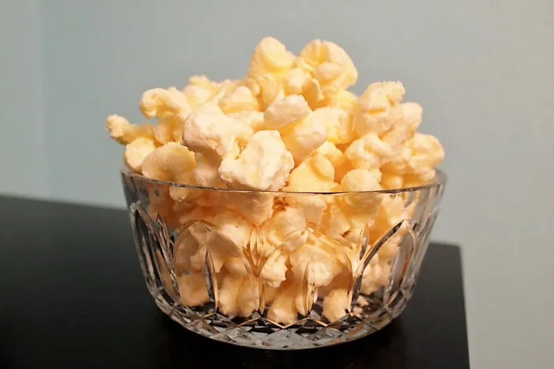 One of the easiest and most delicious desserts ever, this Almond Bark Puffcorn is amazing!