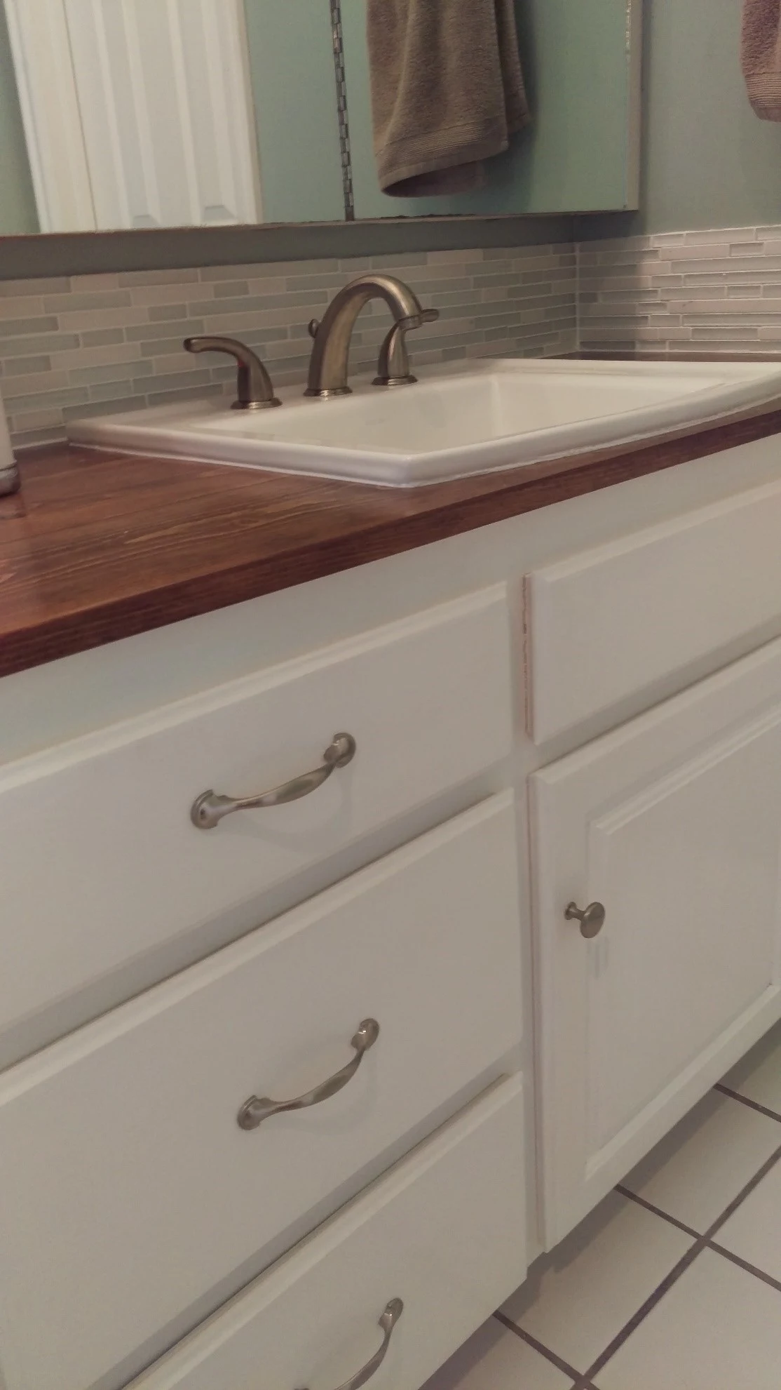 How to Make a DIYWooden Countertop for Your Bathroom coat of paint