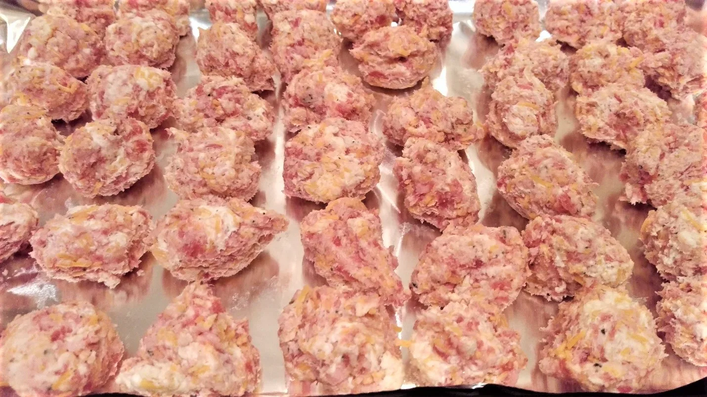 Party Favorite Cream Cheese Sausage Balls forming sausage balls