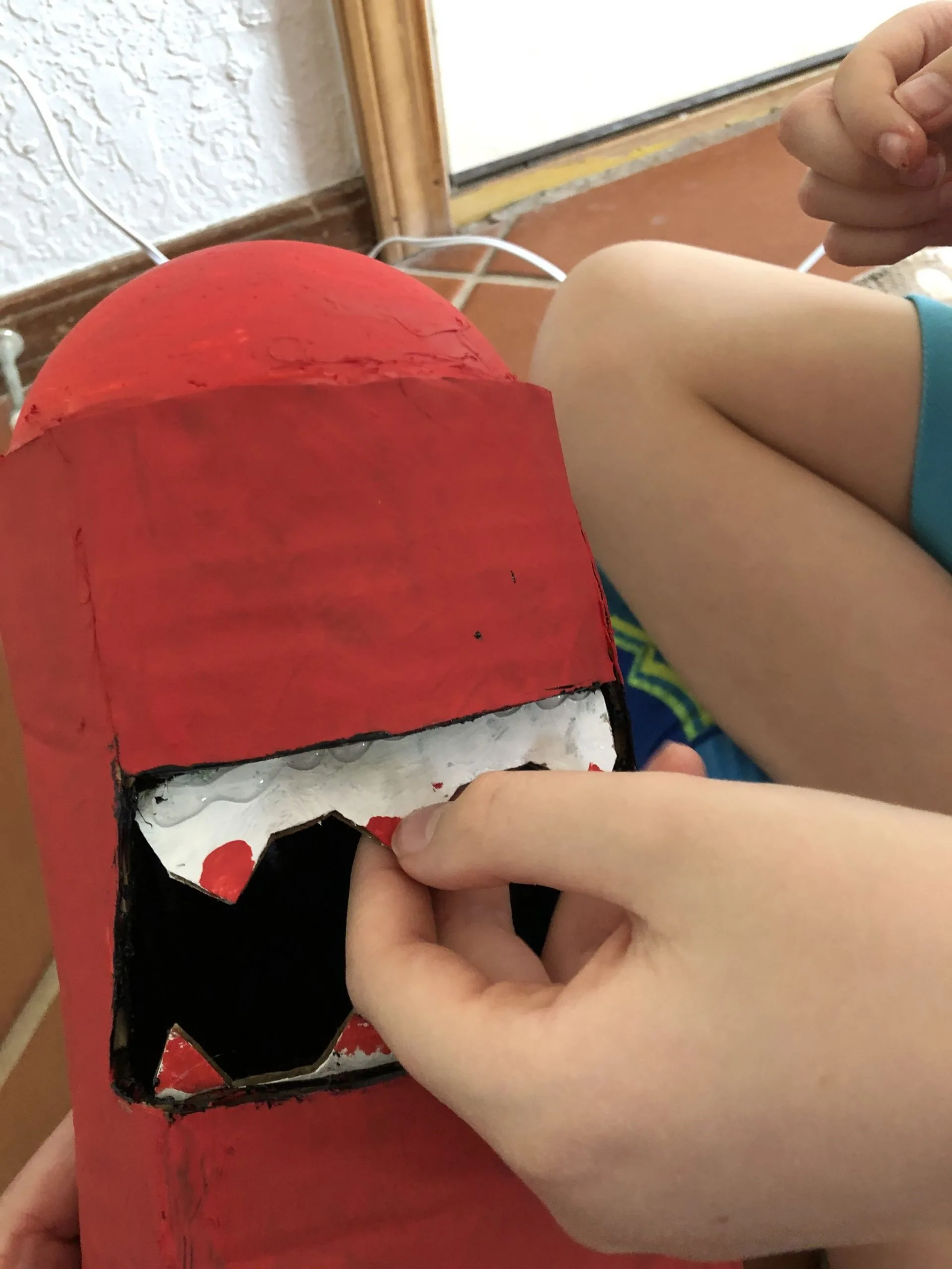 attaching teeth to box